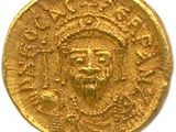 une pièce d'or sur laquelle est représenté le visage d'un homme