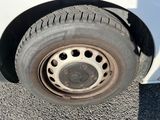 a close up of a flat tire on a vehicle