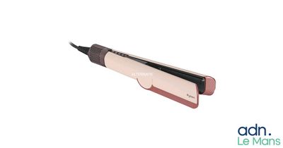 une image montrant un gros plan d'une tondeuse à cheveux sur fond blanc
