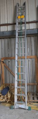 several pieces of wood are stacked on top of each other in a building