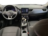 the interior of a car with a steering wheel, dashboard, and dashboard controls