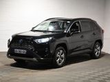 une photo d'une Toyota RAV noire garée dans un garage