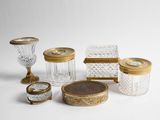 a lot of glass items that are sitting on a table