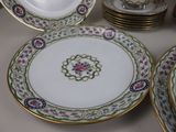 many plates that are sitting on a table