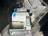 an electronic device sitting in the back of a car
