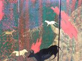 a picture of a painting of a cow and birds on a screen