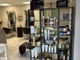 a picture of a salon with a lot of hair products on display