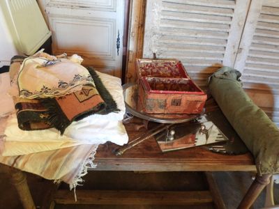 a wooden table with a bunch of items on it