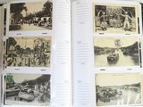 a book with pictures of people and boats in it