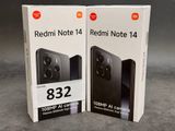 two boxes of redmi note 14 and redmi note 14 on a table