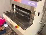 a machine that is sitting in a kitchen next to a counter