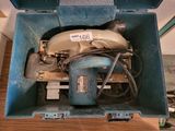 a blue box that has a drill and a drillet in it
