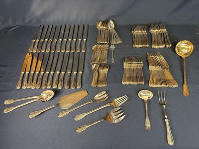 many different types of silverware on the table