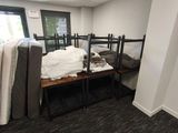an image of a room with a bed and a desk