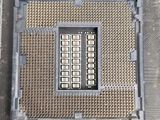 a close up of a cpu chip on top of a motherboard