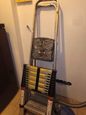 a ladder that is leaning against a wall in a room