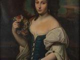 portrait of a woman in a blue dress holding a bouquet of flowers