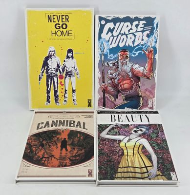 three comics are sitting on top of each other in front of a white background