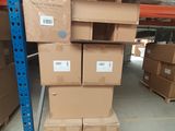 many boxes stacked on top of each other in a warehouse