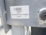 a close up of a metal object with a barcode on it