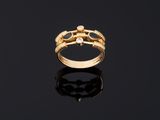an 18k gold ring set with diamonds