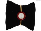 a picture of a bow tie with a watch on it