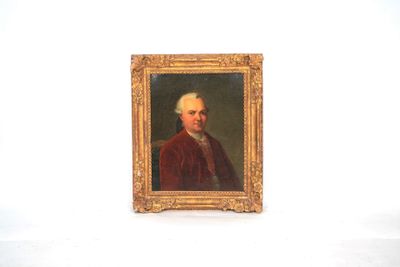 portrait of a man in a red coat in a gold frame