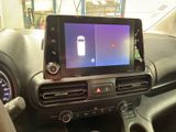 a picture of a car dashboard with a gps device in it