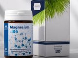a close up of a bottle of magnesium b6 next to a box