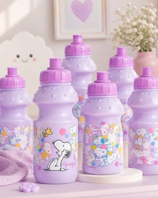 purple bottles with snoop and friends on them sitting on a table