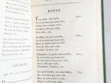 an open book with a picture of a bird on it