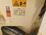 an image of a close up of a trash can with a sticker on it