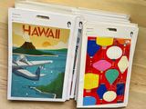 two binders with a picture of a plane and a plane on them