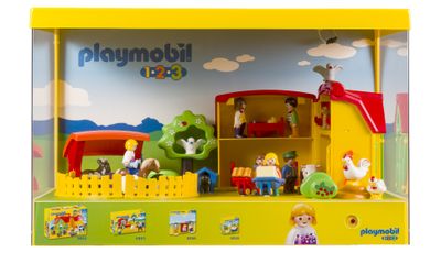 un coffret Playmobil contenant une scène de ferme