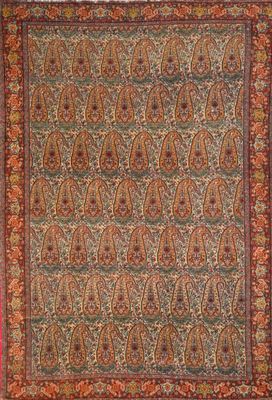 an antique persian rug with a floral design