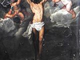 an image of a painting of jesus on the cross surrounded by angels