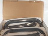 a cardboard box with a bunch of different types of bike parts