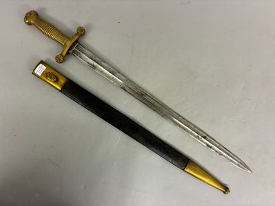 a close up of a knife and a pen on a table