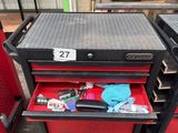 a red tool cart with two drawers on it