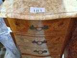 a marble top chest of drawers with a price tag on it
