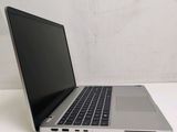 a laptop computer that is sitting on a table