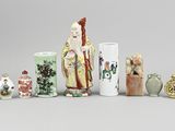 a lot of vases that are sitting on a table