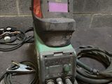 a welder that is sitting on top of a table