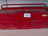 a red tool box with a price tag on it