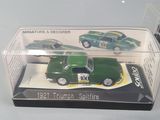 a green toy car and a green toy car in a clear box