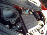 a car engine with the hood open and the hood down