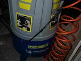 an image of a water heater with a hose attached to it