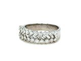 a close up of a diamond ring on a white background