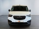 the front view of a white opel parked in a room