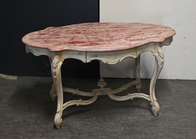 a table that has a marble top on it